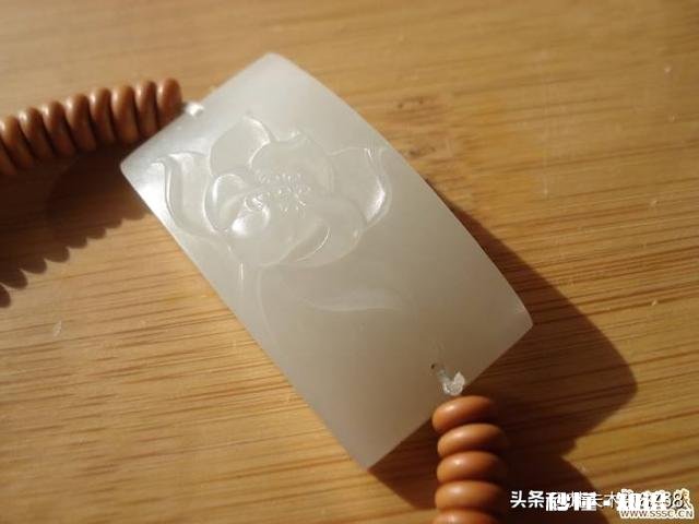 平面玉雕手工与精雕哪个更好